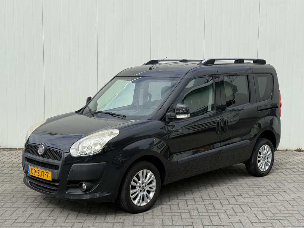 Fiat Doblò 1.4 T-Jet 120pk Emotion Rolstoelauto 3+1 - Bodemverlaging - Luxe uitvoering - Rolstoelvervoer 54123740-0.jpg | All Selection Cars